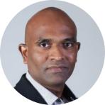 Portrait of Naveen Adusumilli, founding attorney of Nomik Legal with expertise in agricultural and property law